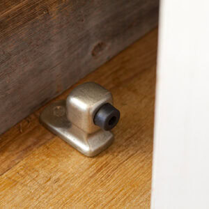 Rocky Mountain Short Floor Door Stop in Silicone Bronze Brushed finish.